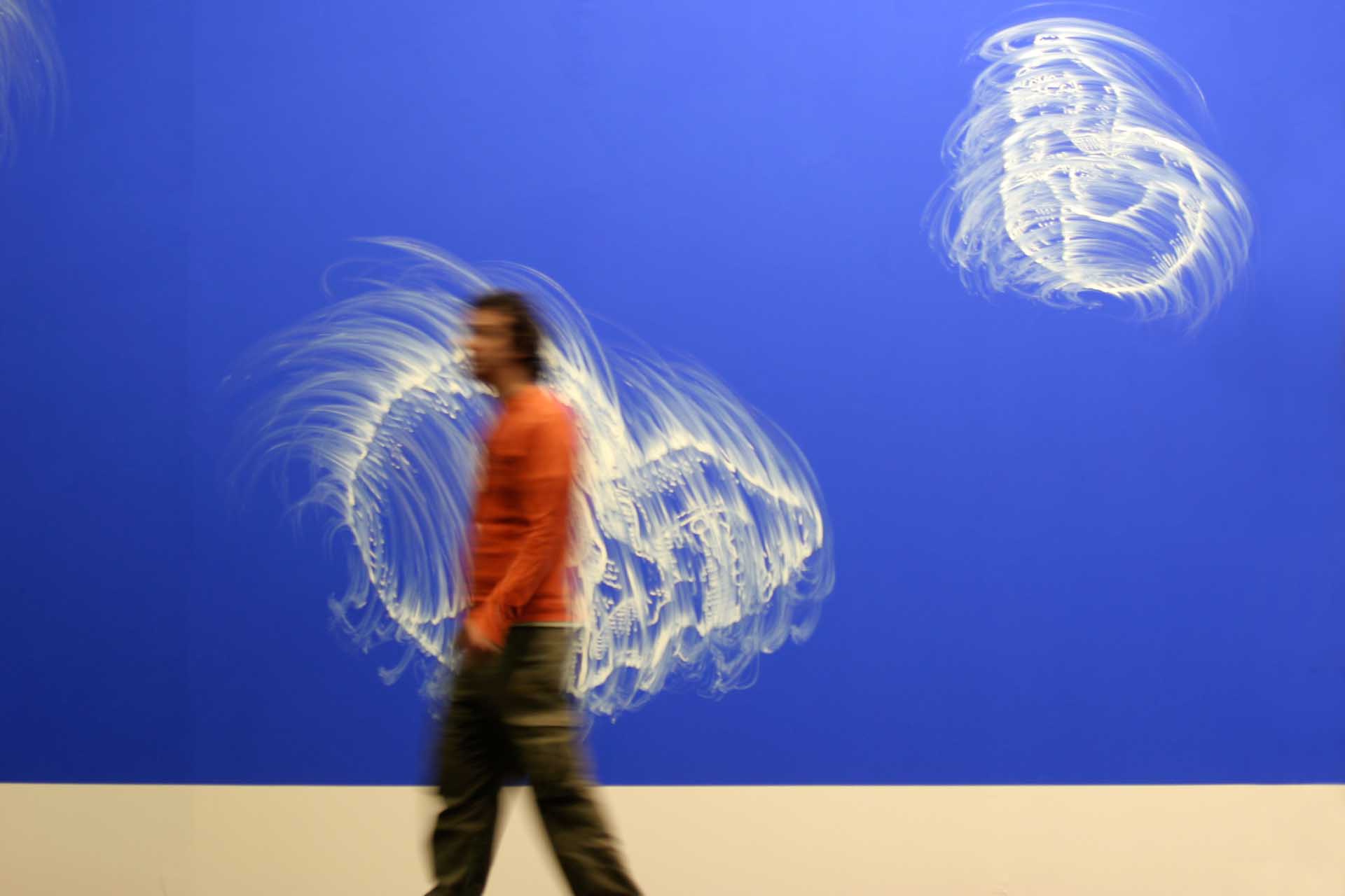 Art 38 Unlimited: Installation with a large blue painting by Gary Simmons: "Skull Spill", 2007