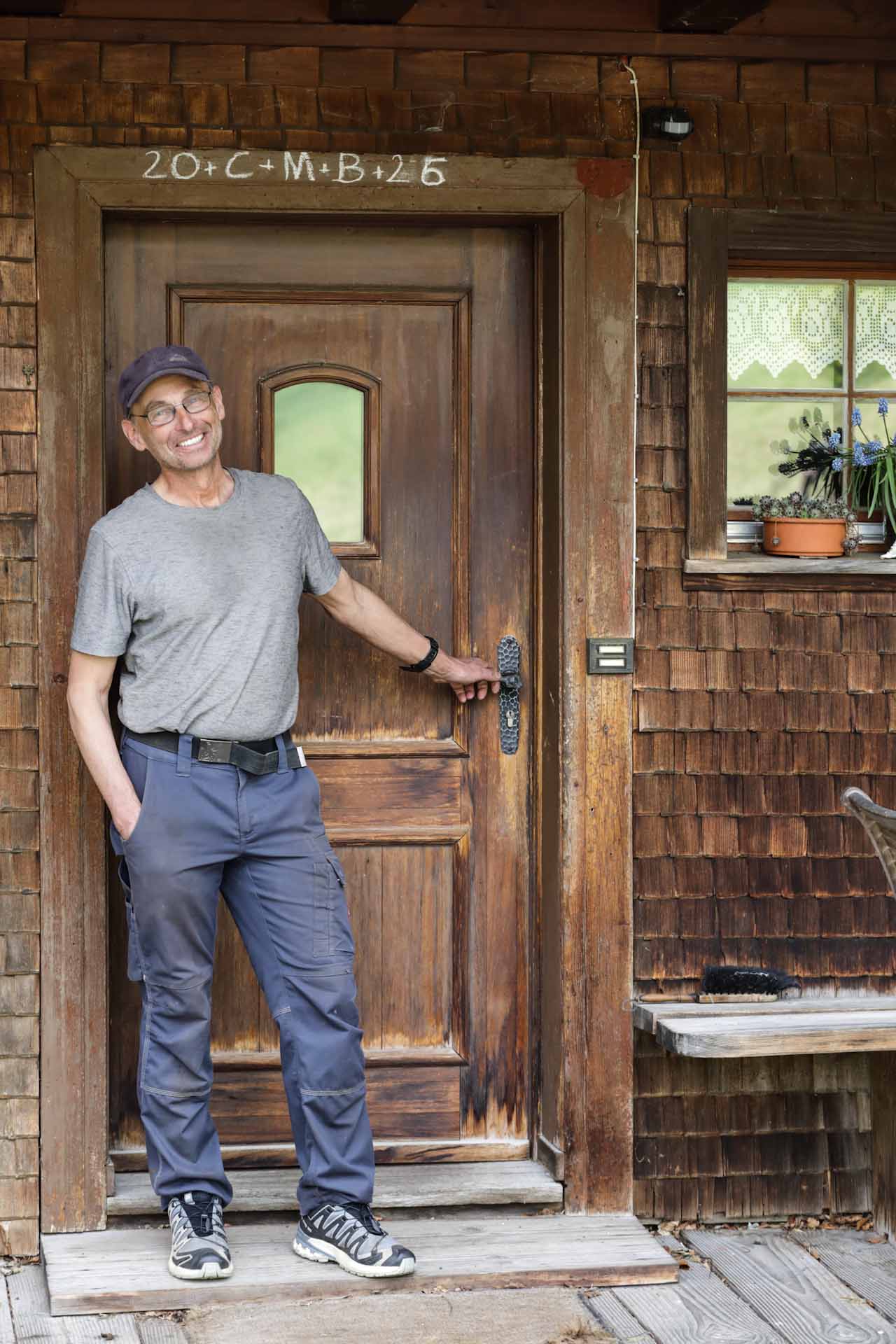 Ewald Lorenz at the front door of the Dobelhof farmhouse in Hofsgrund, where two boys knocked at the door asking for help on April 17 1936. His grandparents took them in.